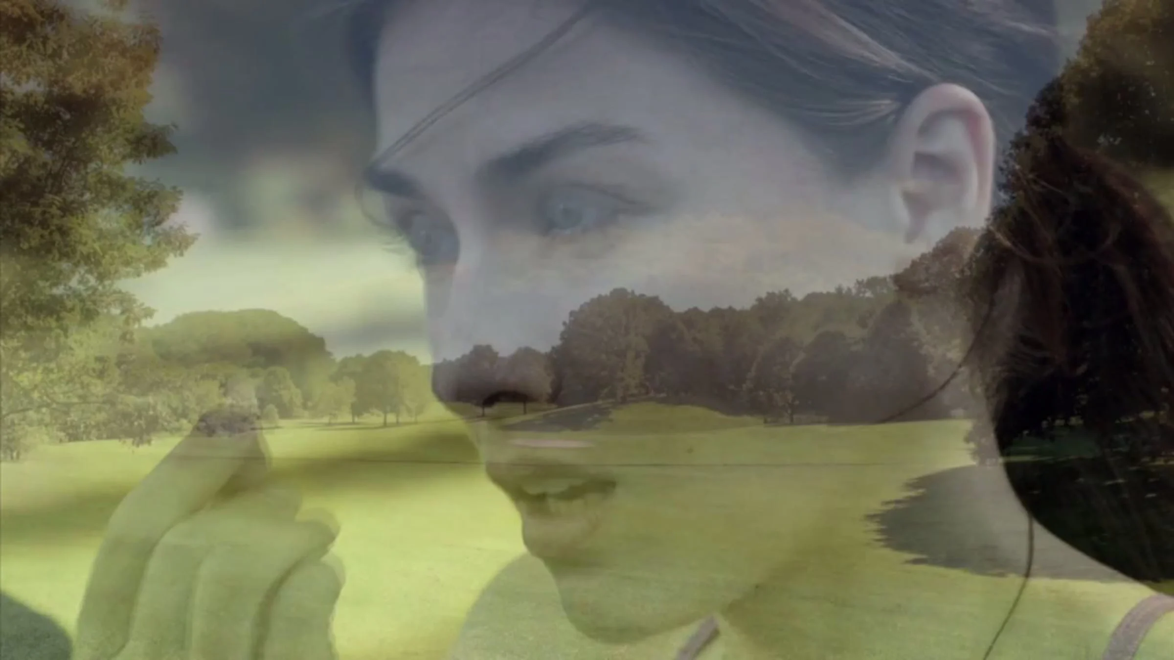 A translucent close-up of a woman touching a contact lens is layered over a sunlit park in the Eden 2045 trailer image.